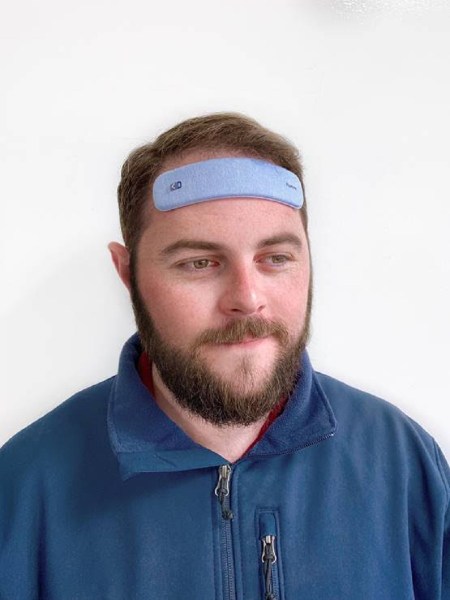 Iain McIntyre, CEO of Humm, wears a Humm patch.