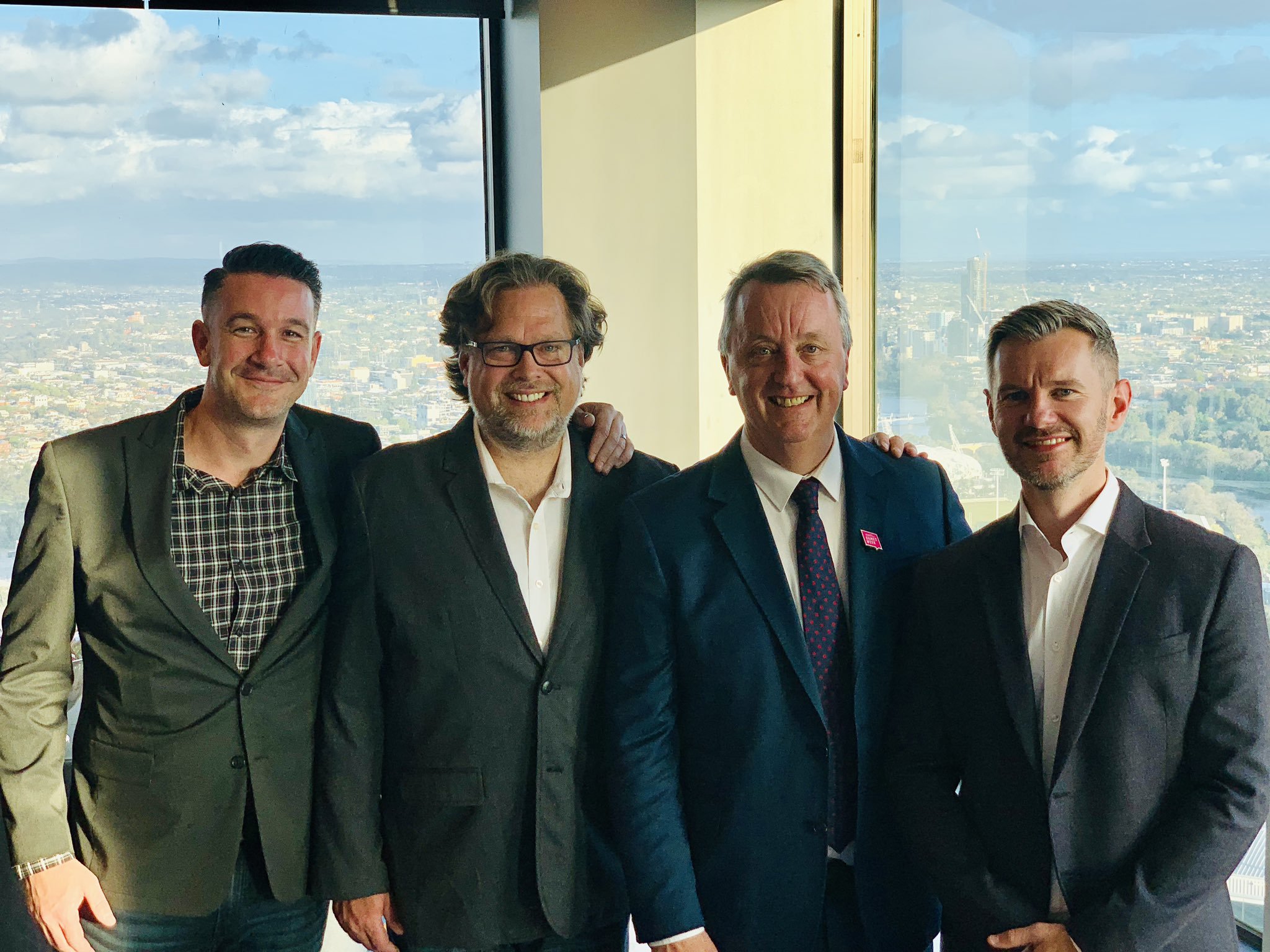 From left to right: Sledgehammer communications director Brian Miggels, studio head Aaron Halon, Minister of Creative Industries Martin Foley, and Andy Wilson.