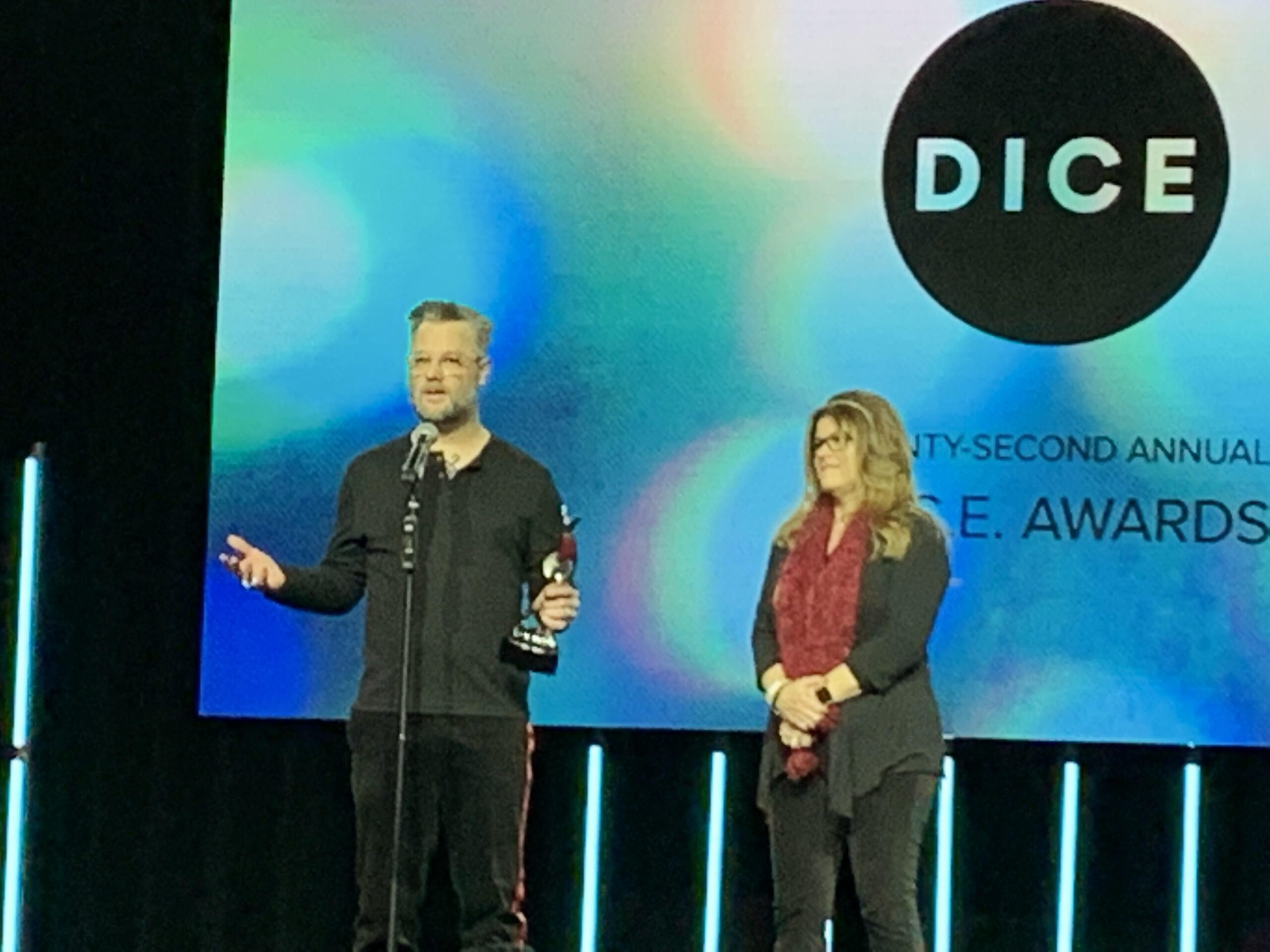 Cory Barlog accepts best story award at DICE Awards for God of War.