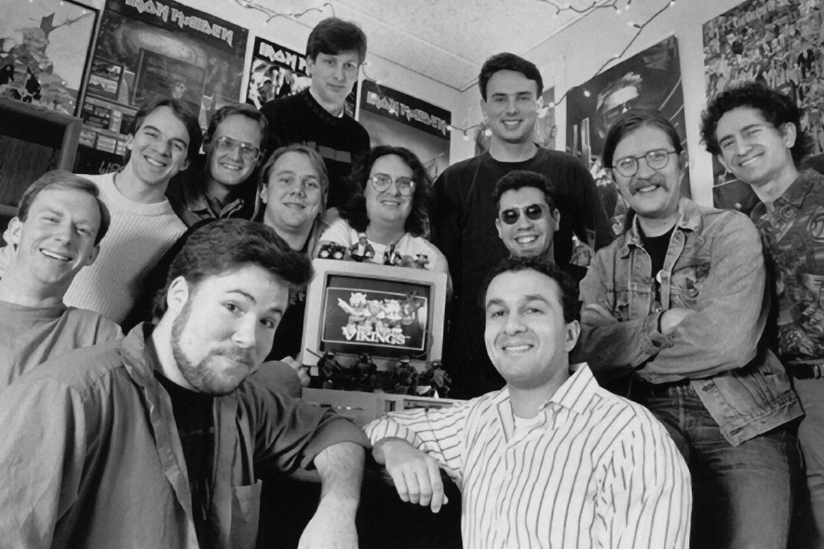 The early Blizzard team (then known as Silicon & Synapse), with Allen Adham in the striped shirt and Mike Morhaime on the far right. Frank Pearce is on the far left.