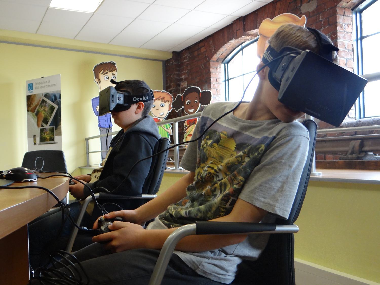 Kids testing out the Oculus Rift.