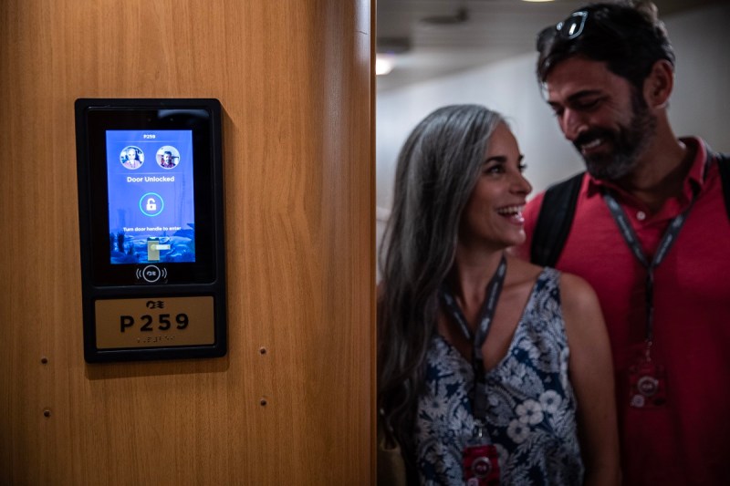 Your wearable unlocks the door on the Carnival Royal Princess cruise ship.