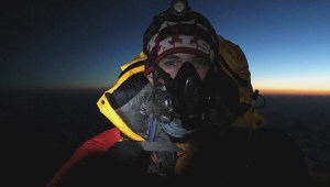 Dean Hall on the summit of Mount Everest.