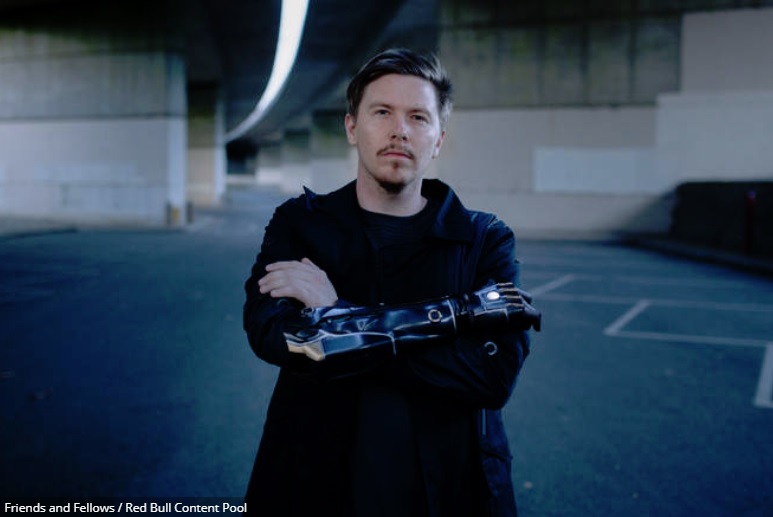 Danielle Melvilled donned his bionic arm with an Adam Jensen outfit from Deus Ex.