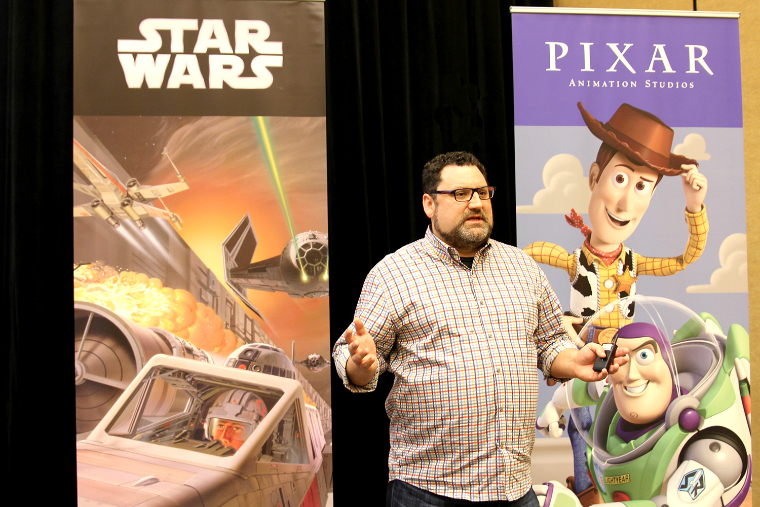 Heatherly speaking with developers behind closed doors at GDC.
