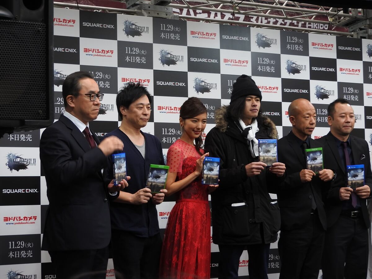 The guy with the long hair was the first fan to buy Final Fantasy XV.