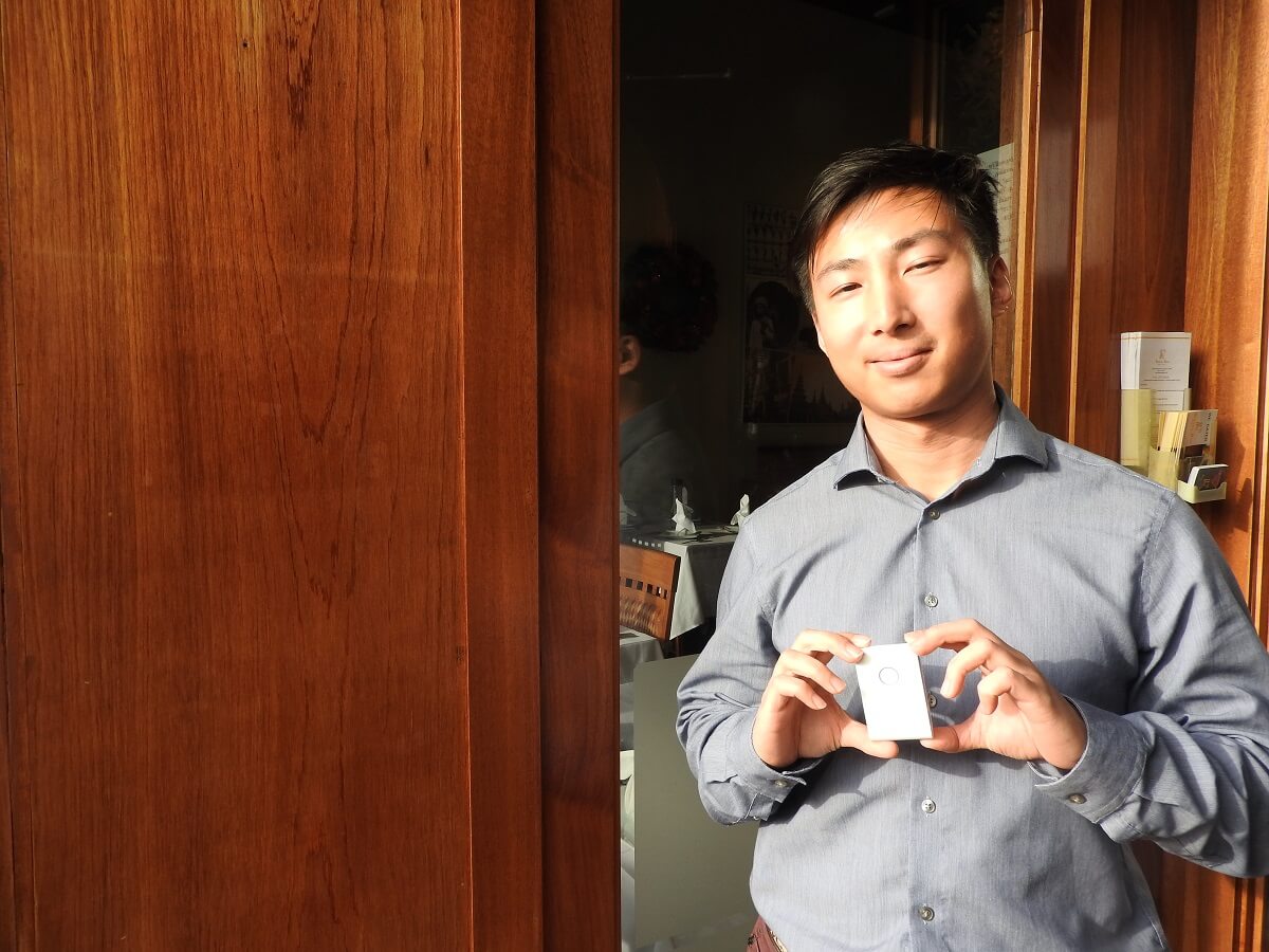 Li "Ricky" Ge shows off Healer Tech's Flexr sensor for muscle rehab.