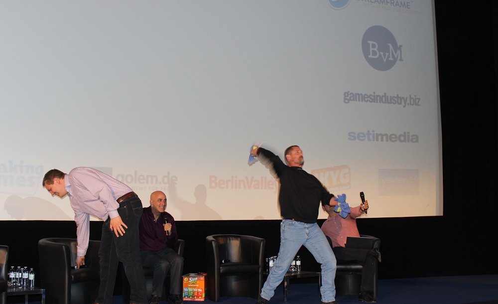Glen Schofield of Sledgehammer Games tosses Call of Duty T-shirts into the Quo Vadis audience.