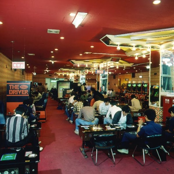 Inside a Space Invaders house with tabletop machines in Japan.