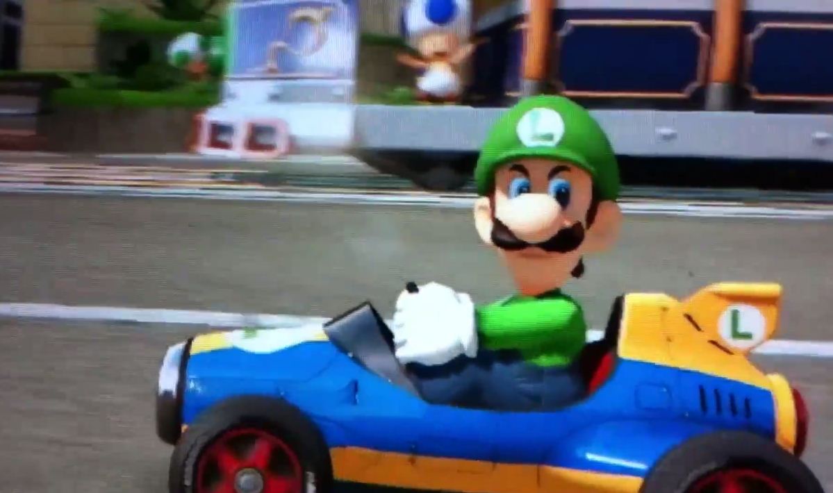 Luigi giving his menacing look to other racers in Mario Kart 8.