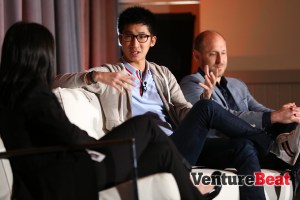 Brian Wong, center, co-founder and chief executive of Kiip, and Gregg Colvin, chief operating officer of Universal McCann, right, at VentureBeat's Mobile Summit conference in Sausalito, Calif., on April 14.