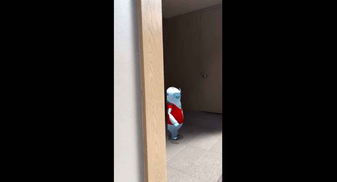 This character is occluded by a real-world wall.
