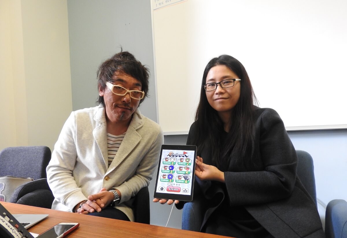 Norio Nakayama (left) and Akiko Katagiri of Obokaidem show off Ninja Spinki Challenges.