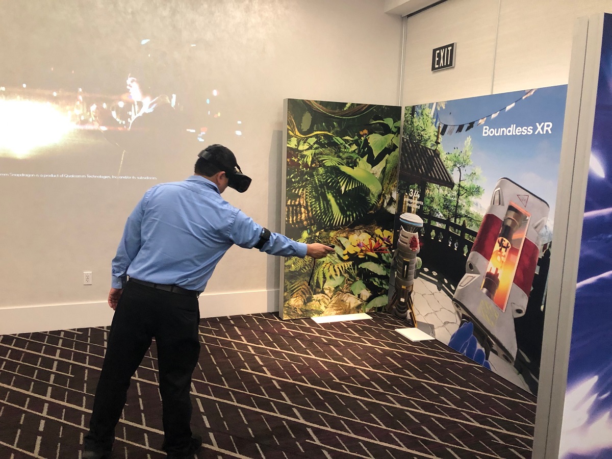 Dean Takahashi demos a Qualcomm XR virtual reality headset.