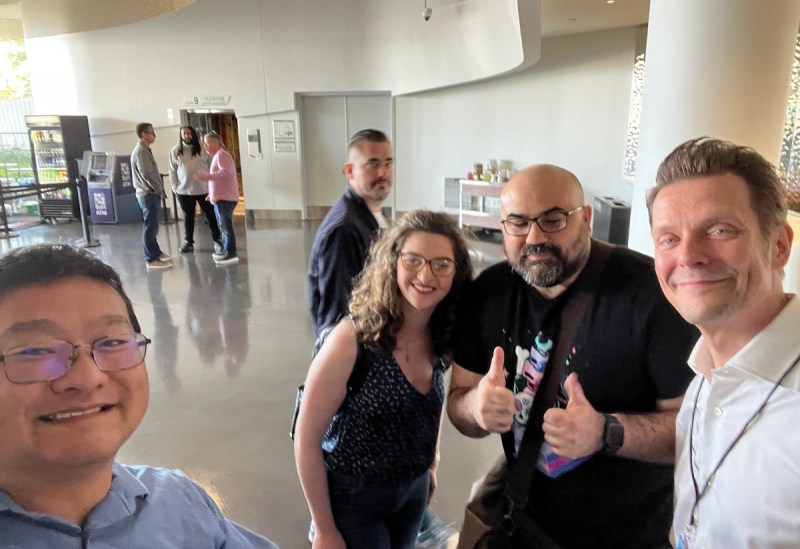 The GamesBeat crew gets a selfie with Sam Lake. Thomas Puha is the photobomber.