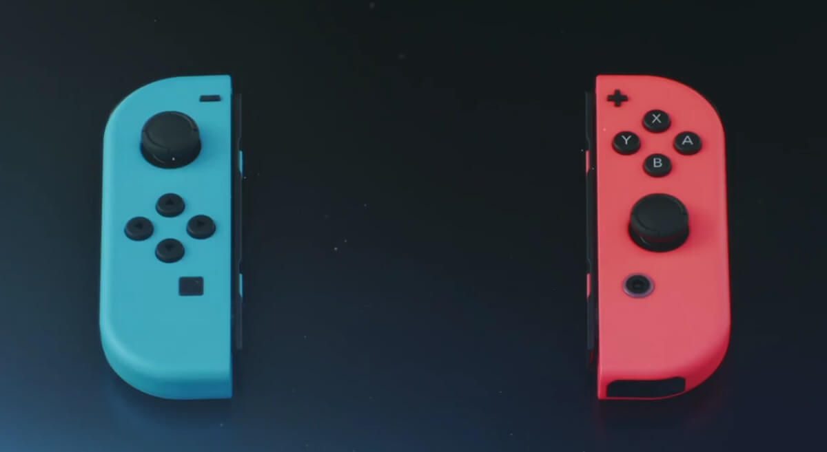 Nintendo's new Joy Con controller comes in black, blue, or red.