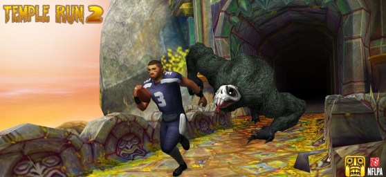 Russell Wilson of the Seattle Seahawks flees the demon monkey in Temple Run 2.