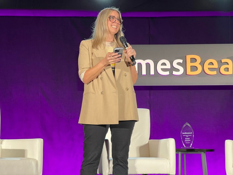 Meggan Scavio accepts the Visionary Award at the GamesBeat Summit 2023 event.