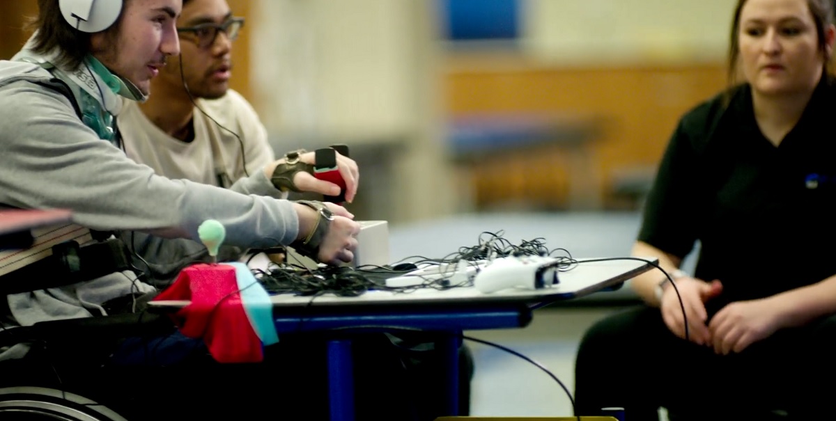 A patient at Craig Hospital in Denver, Colorado, tries out the Xbox Adaptive Controller with custom options.