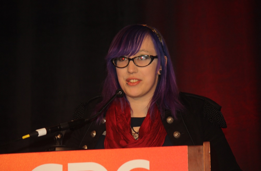 Zoe Quinn speaks about harassment at the Game Developers 2015 event.