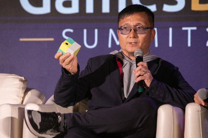 Tom Kang, president of Nex, holds the Nex Playground at GamesBeat Summit 2025.