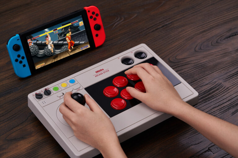 The 8BitDo Arcade Stick works with Switch and PC.