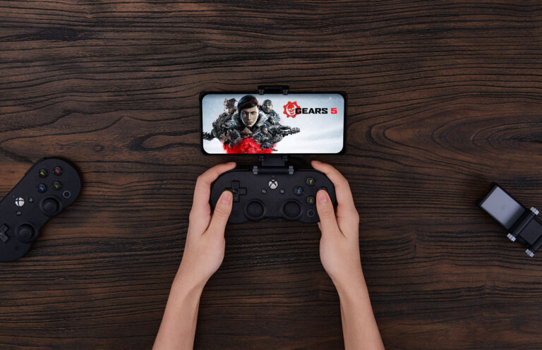 A controller clipped to a phone.