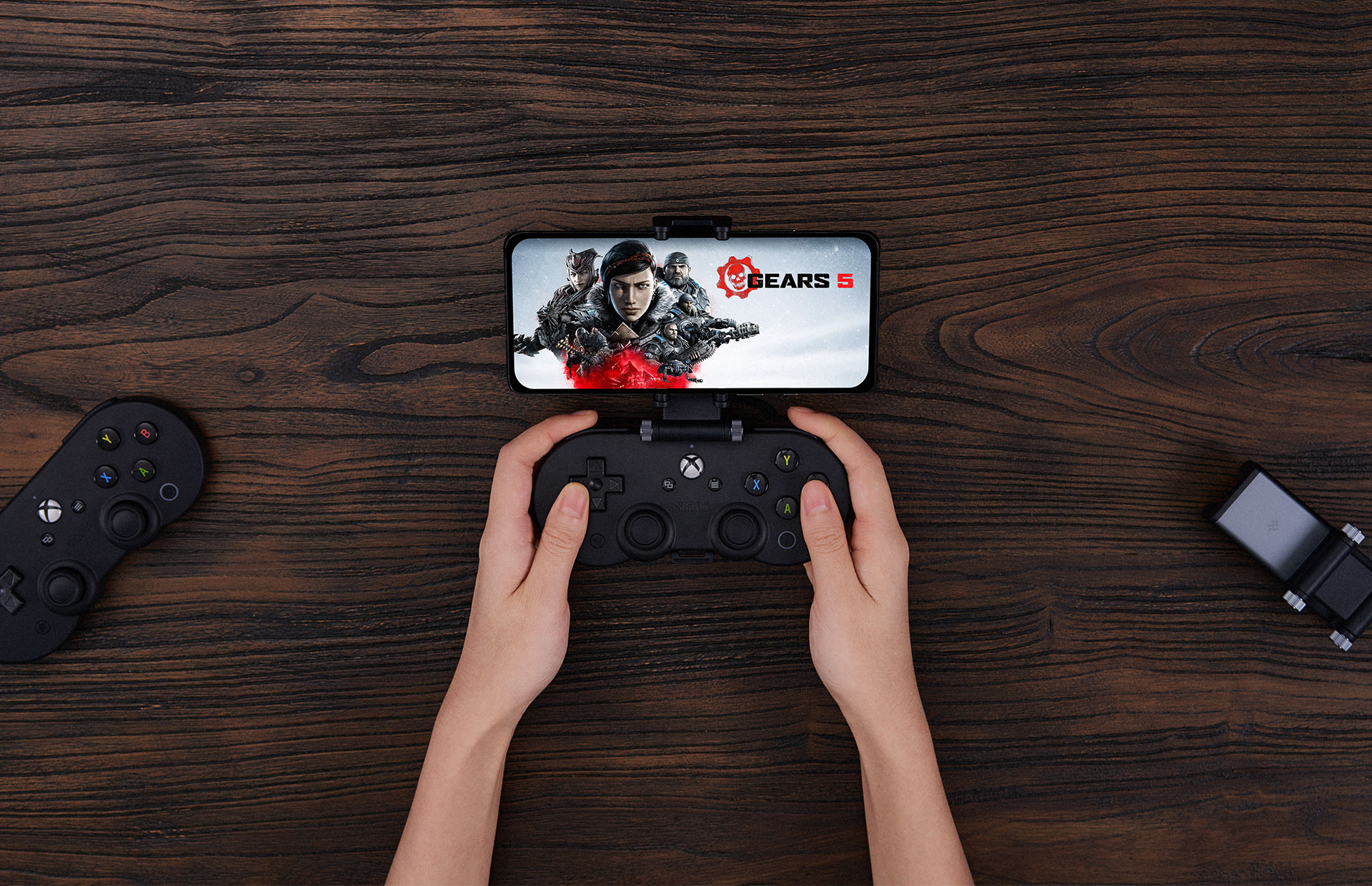 A controller clipped to a phone.