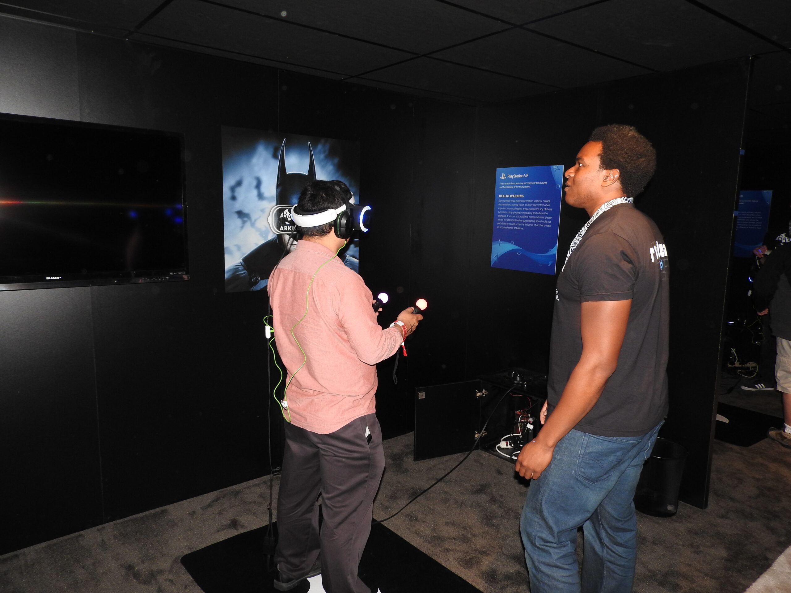 Dean Takahashi tries Batman Arkham VR at Warner Bros.' booth