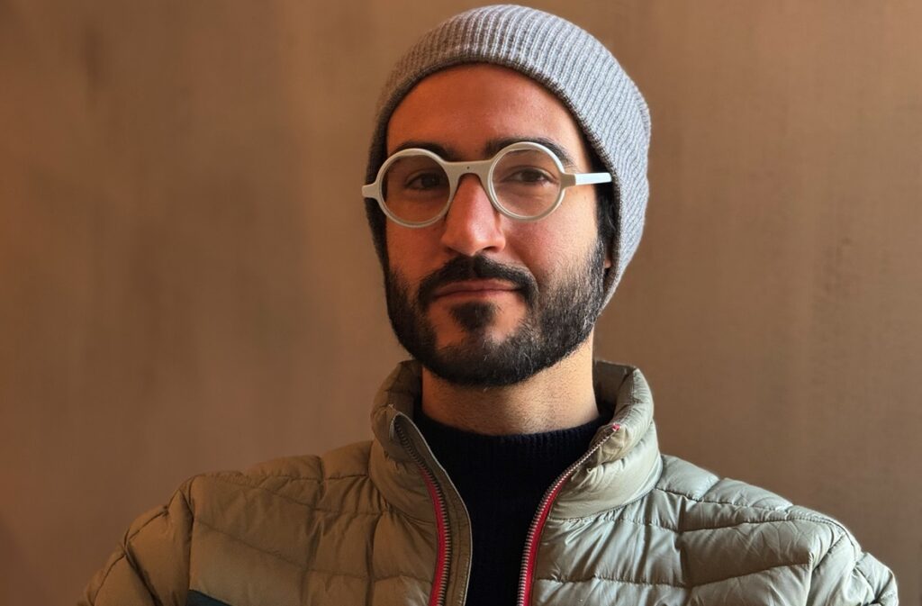 Brilliant Labs CEO shows off Frame AI glasses.