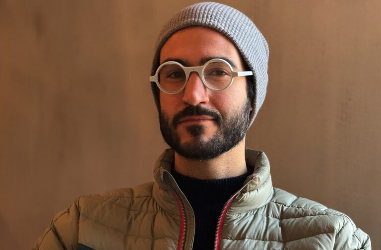 Brilliant Labs CEO shows off Frame AI glasses.