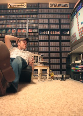 Nintendo Twizer kicking back and enjoying his collection with R.O.B. the Robot.