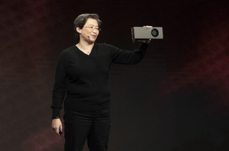 Lisa Su, CEO of AMD, shows off the 7-nanometer Navi GPU.