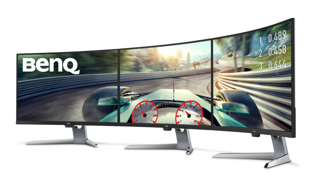 The BenQ EX3203R in a three-monitor setup.