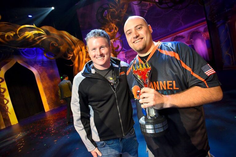 Wizards of the Coast president Chris Cocks (left) stands with 2016 Magic World Champion Brian Braun-Duin.
