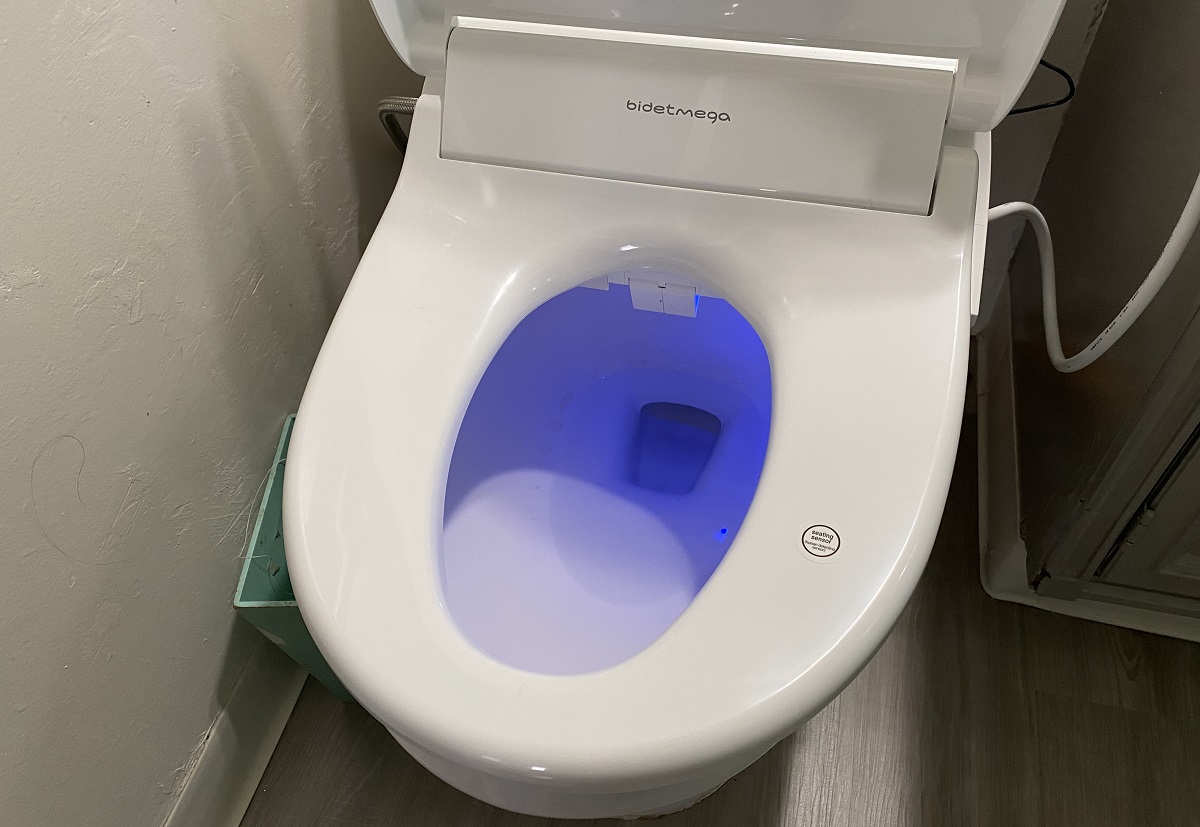 The serene blue waters of the LED-lit Coway Bidetmega 400.