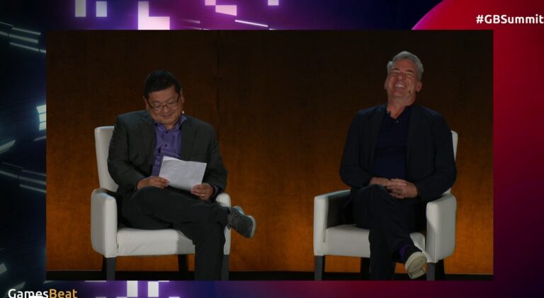 Dean Takahashi (left) and David Haddad, head of Warner Bros. Games, at GamesBeat Summit 2023.