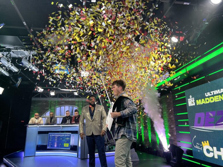 Dez gets his $250,000 check for winning the Madden Bowl.