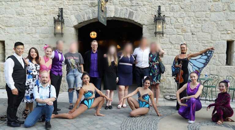 Japheth Dillman (in black coat and purple shirt) at the Dahlias party.