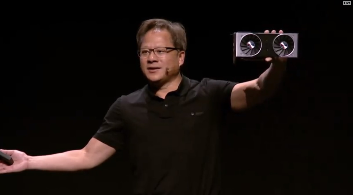 Nvidia CEO Jensen Huang shows off the Nvidia GeForce RTX 2080 Ti at Gamescom 2018.