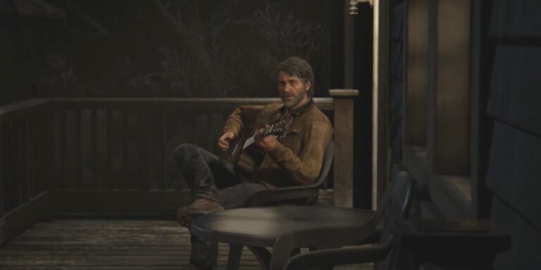 Joel plays a guitar at the start of The Last of Us Part II.