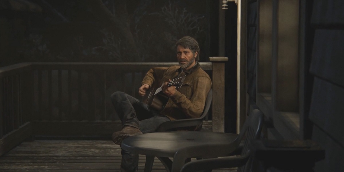 Joel plays a guitar at the start of The Last of Us Part II.