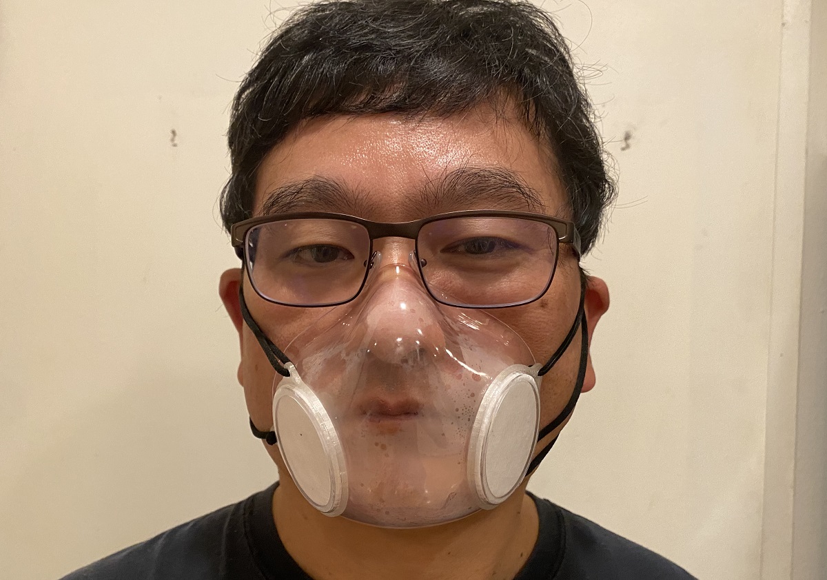 Dean Takahashi wears a 3D-printed mask.