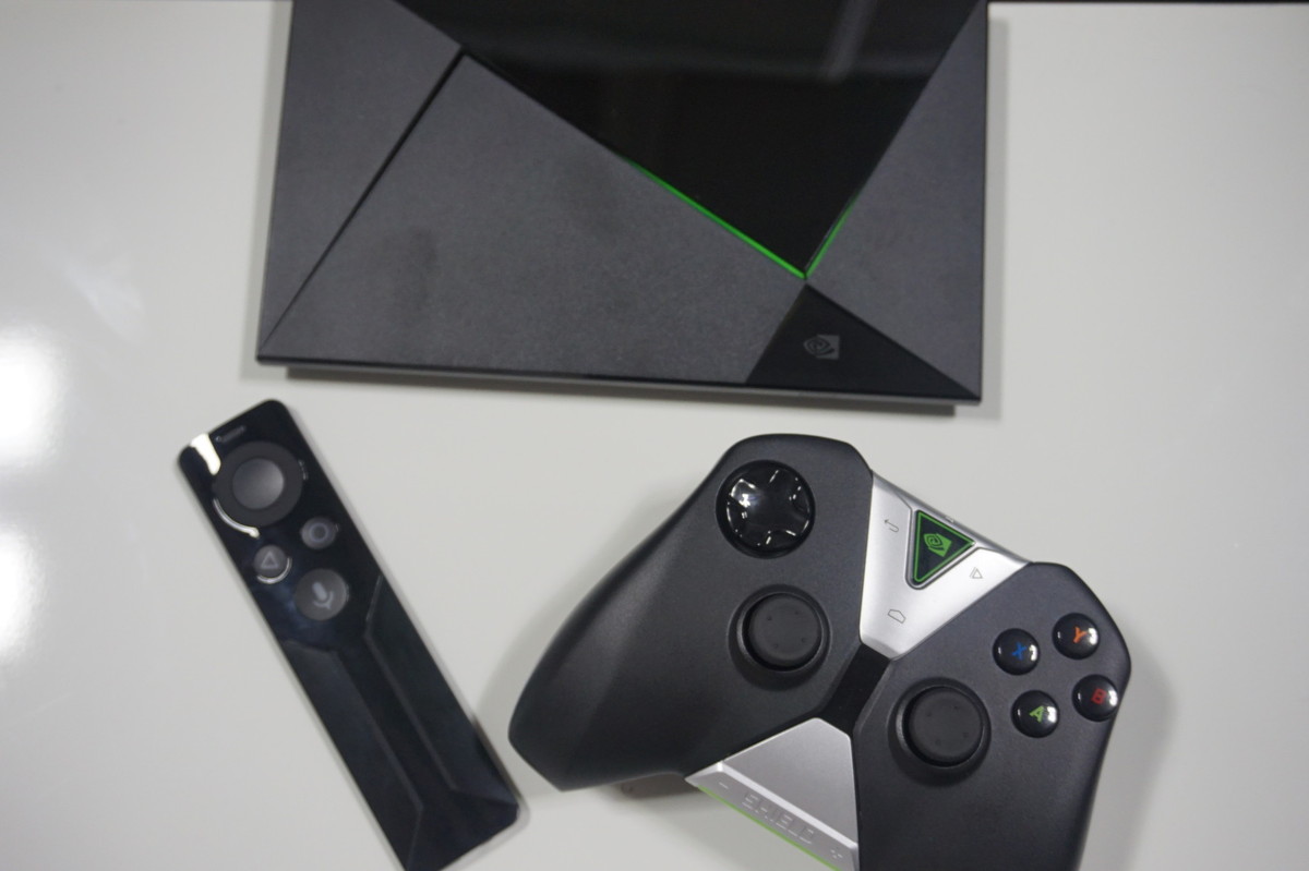 The Nvidia Shield microconsole with remote and gamepad.