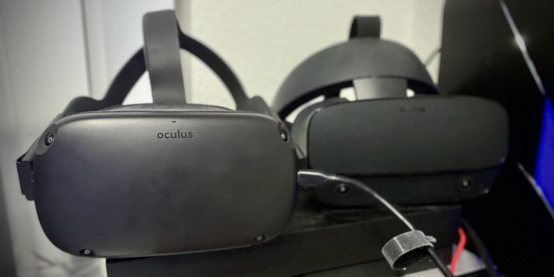 Oculus Quest (left) connected to an Anker USB cable for Oculus Link, alongside the Oculus Rift S (right).