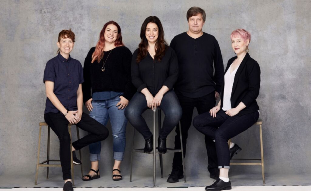 Robin Games' team, with CEO Jill Wilson in the center.