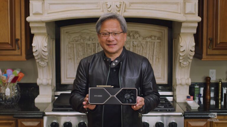 Nvidia chief executive Jensen Huang holds an RTX 3080.