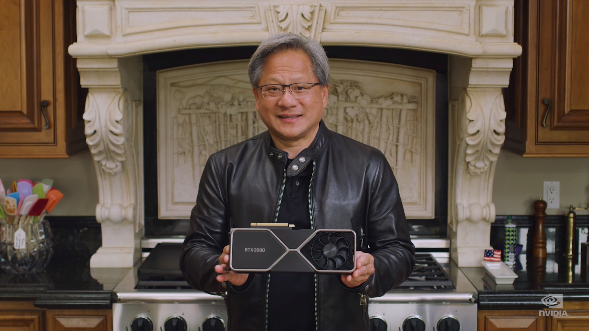 Nvidia chief executive Jensen Huang holds an RTX 3080.