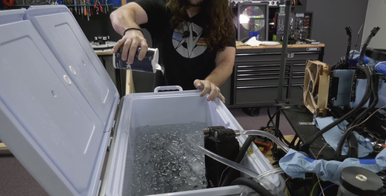 Steve Burke of Gamers Nexus uses salt to lower the temperature of his ice-bucket cooler.