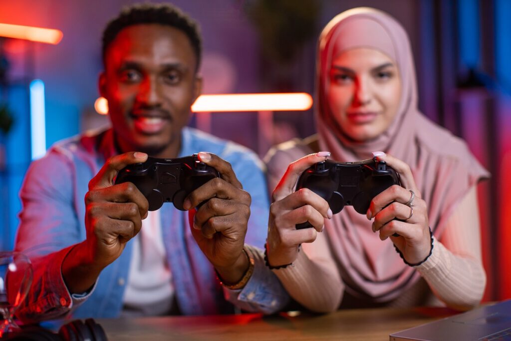 Muslim woman in hijab playing with an American man.